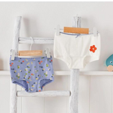 Tchibo Toddler girls' organic cotton underwear in purple with multi-colored flower print