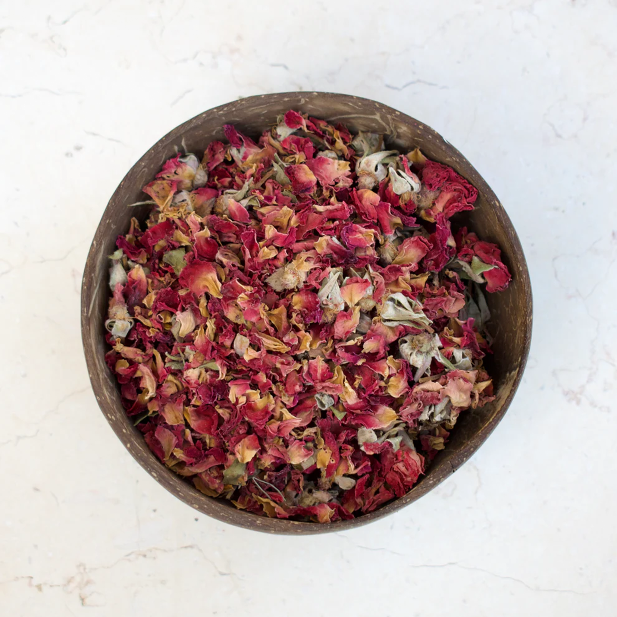 Organic dried rose petals from Ancient Naturals, sustainably harvested in Egypt for tea, skincare, and aromatherapy.