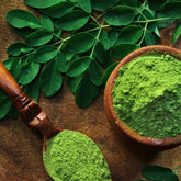 Blessed Journey Organic Moringa Leaf Powder in kraft bag from El Meraki, vibrant green Egyptian superfood for energy and nutrition.