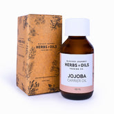 Blessed Journey Pure Golden Jojoba Oil in a dark glass bottle from El Meraki, a versatile balancing oil for face, hair, and skin care.