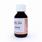 Blessed Journey 100% Pure Moroccan Argan Oil in a dark glass bottle from El Meraki, a meta health beauty elixir for skin and hair.