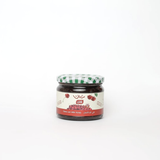 Jar of Cherry Jam from Bostan Set El Hosn, 300 gm, featuring a green and white checkered lid and a label with both Arabic and English text.