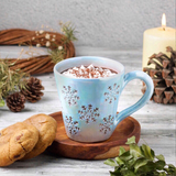 Handcrafted Christmas Ceramic Frost Mug from Cattleya Egypt, a white festive mug for coffee and tea.