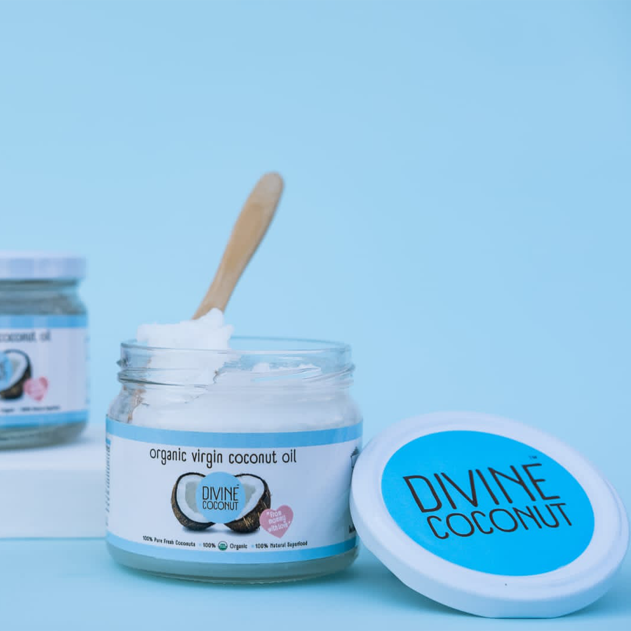 Divine Coconut Organic Virgin Coconut Oil – Glass jar of cold-pressed coconut oil for cooking and skincare, available in Egypt