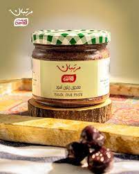 Jar of Black Olive Paste with Basil & Garlic in Olive Oil by BOSTAN SETELHOSN, an antioxidant-rich Egyptian spread.