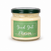 Jar of creamy Good Gut Mama Mayonnaise made in Egypt, with a spoonful showing its rich texture.