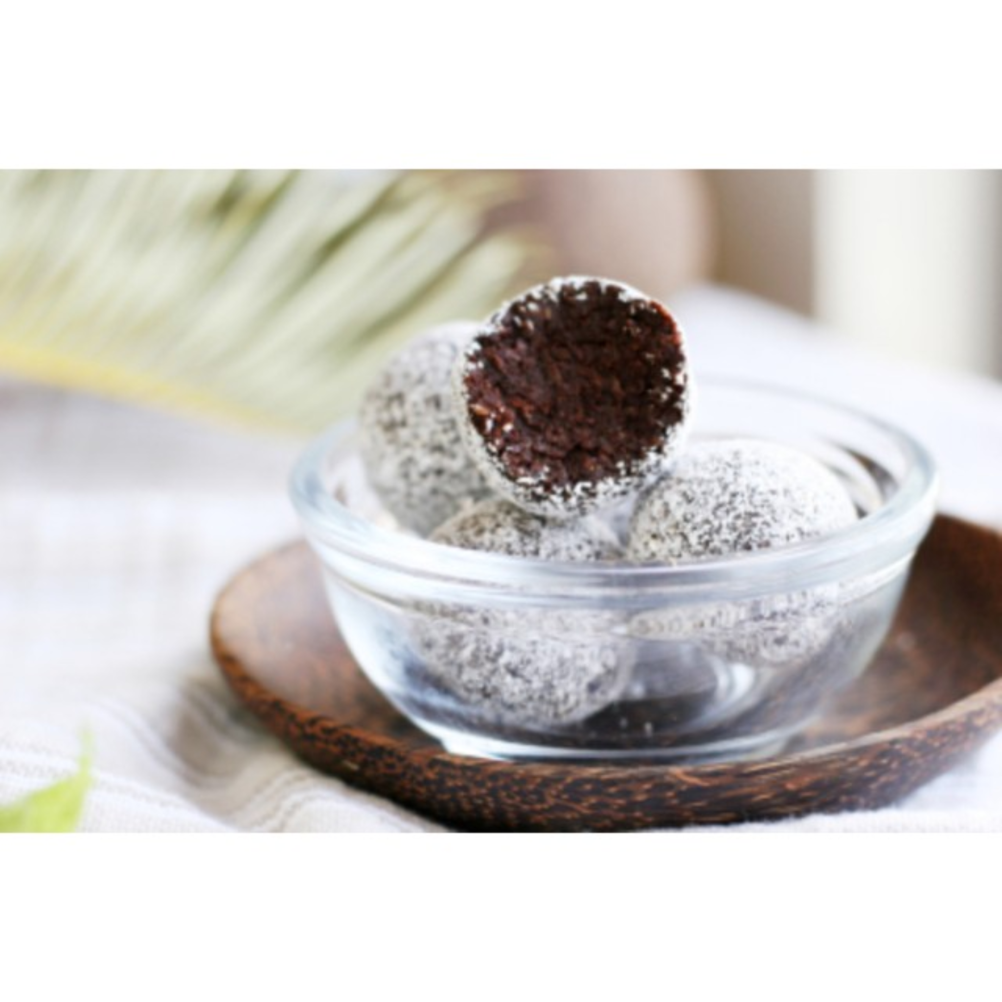 kaju truffles – assortment of hand-rolled chocolate truffles dusted with cocoa and nuts, made in egypt.