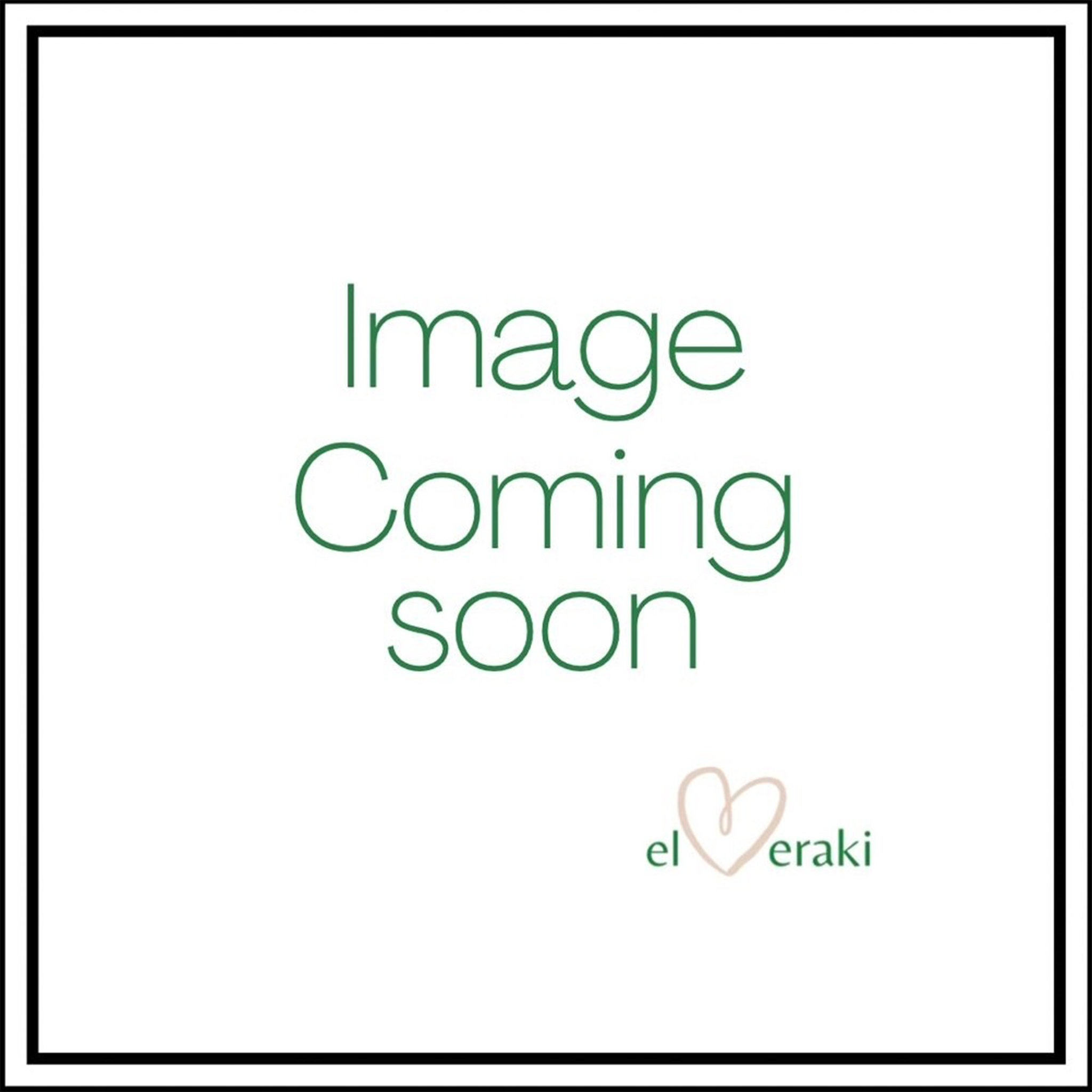 A bowl of Komm El Dikka's traditional Foul Medammes, a frozen fava bean dish, garnished with olive oil and lemon, from El Meraki.