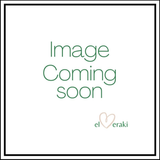 A bowl of Komm El Dikka's traditional Foul Medammes, a frozen fava bean dish, garnished with olive oil and lemon, from El Meraki.