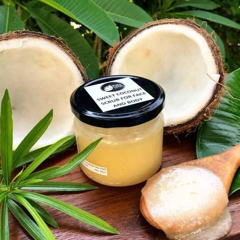 Black Lotus Coconut Oil Sugar Scrub for exfoliating and moisturizing skin. Produced in Egypt.