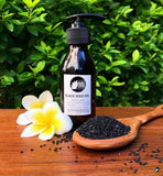 Bottle of Black Lotus Black Seed Oil, Egyptian-crafted for skin health and wellness.