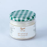 Jar of Raw Coconut Oil from Bostan Set El Hosn, 250g, featuring a green and white checkered lid and a label with both Arabic and English text.