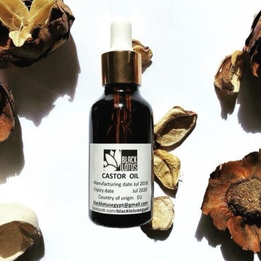 Bottle of cold-pressed castor oil for hair and skin by Black Lotus, made in Egypt.