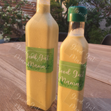 Fermented Caesar Dressing from Good Gut Mama, available at Elmeraki, displayed in a bottle with fresh salad greens.