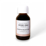 Bottle of Blessed Journey Ethiopian Black Seed Oil (Habbit Shifa), a cold-pressed natural supplement for immune support, skin, and hair care.