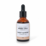 Blessed Journey Sweet Almond Oil, a cold-pressed natural oil for moisturizing skin, hair care, and massage, made in Egypt.