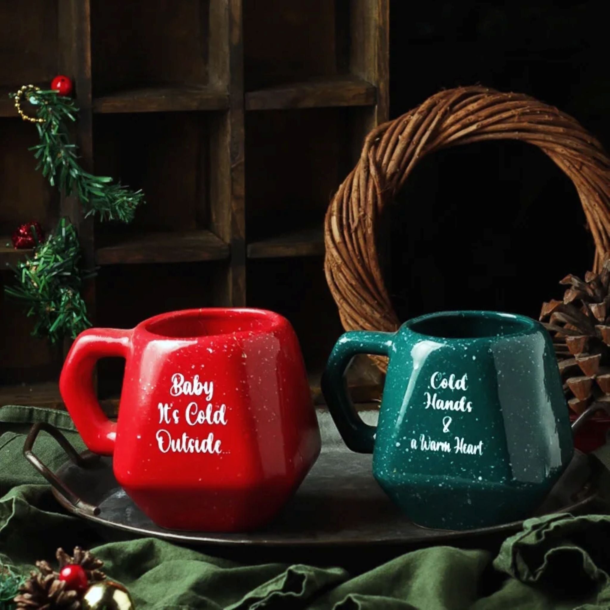 The Cattleya Egypt Handcrafted Christmas Ceramic Mugs Collection, featuring red, green, and frost designs.