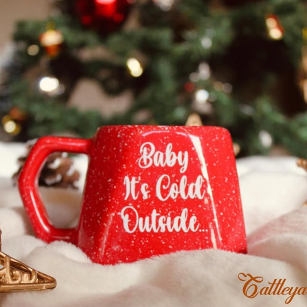 The Cattleya Egypt Handcrafted Christmas Ceramic Mugs Collection, featuring red, green, and frost designs.