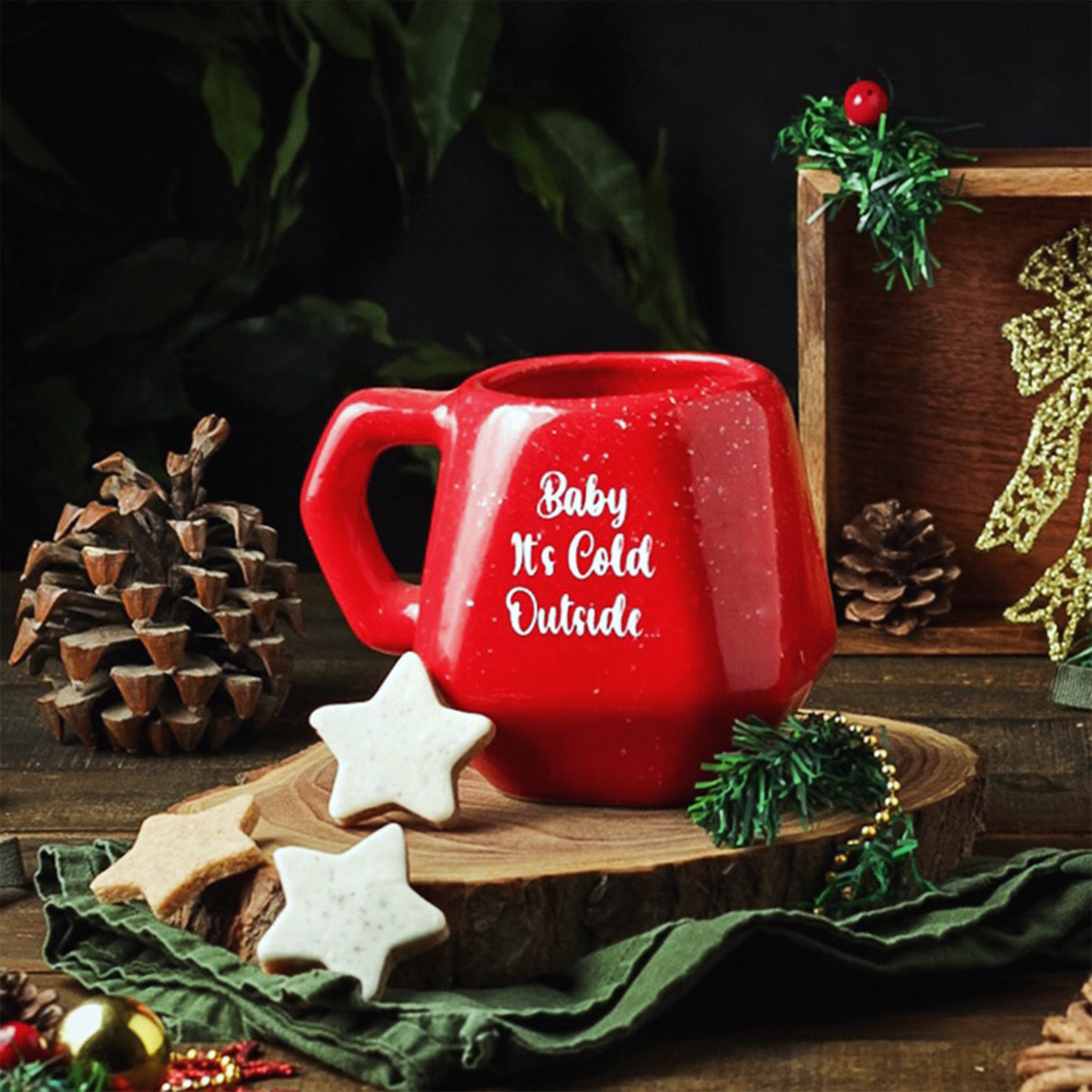 The Cattleya Egypt Handcrafted Christmas Ceramic Mugs Collection, featuring red, green, and frost designs.