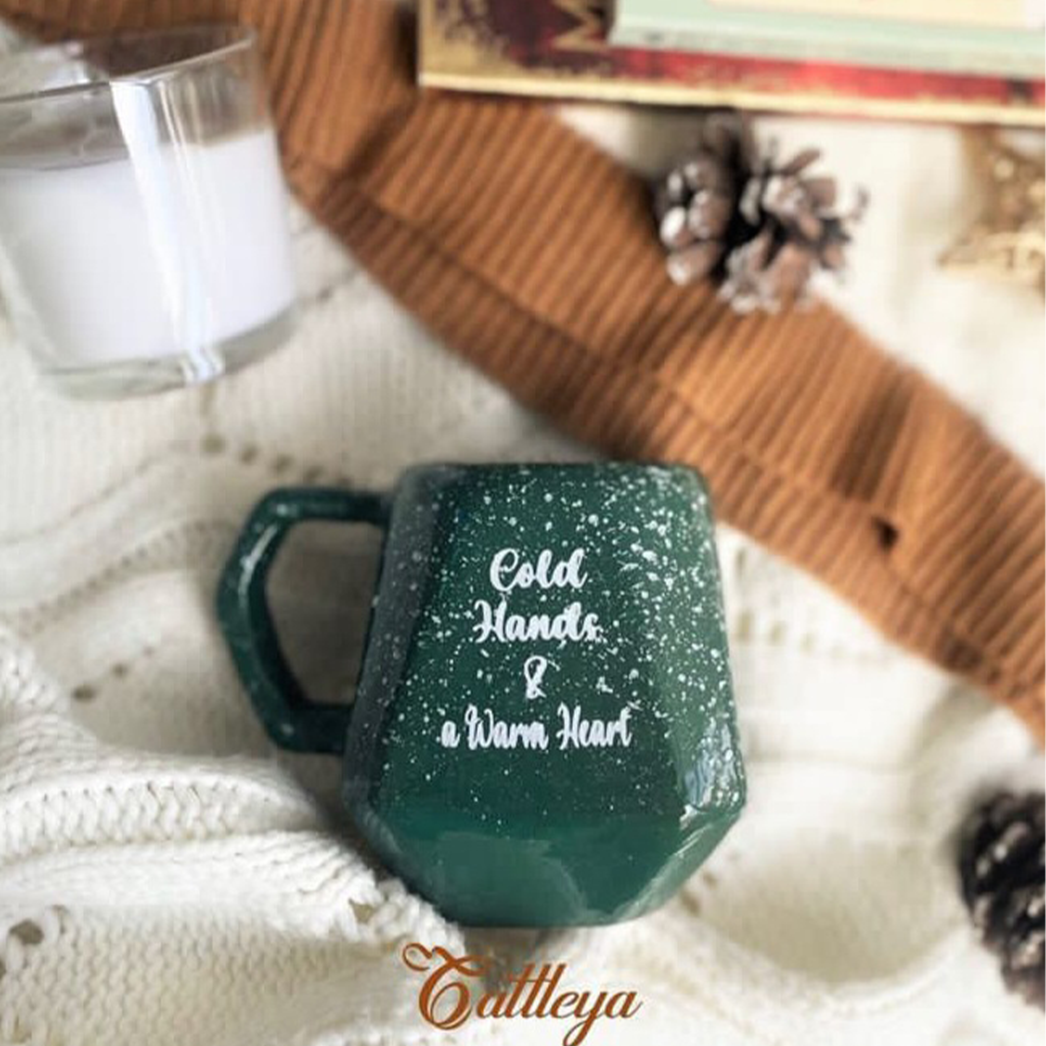 The Cattleya Egypt Handcrafted Christmas Ceramic Mugs Collection, featuring red, green, and frost designs.