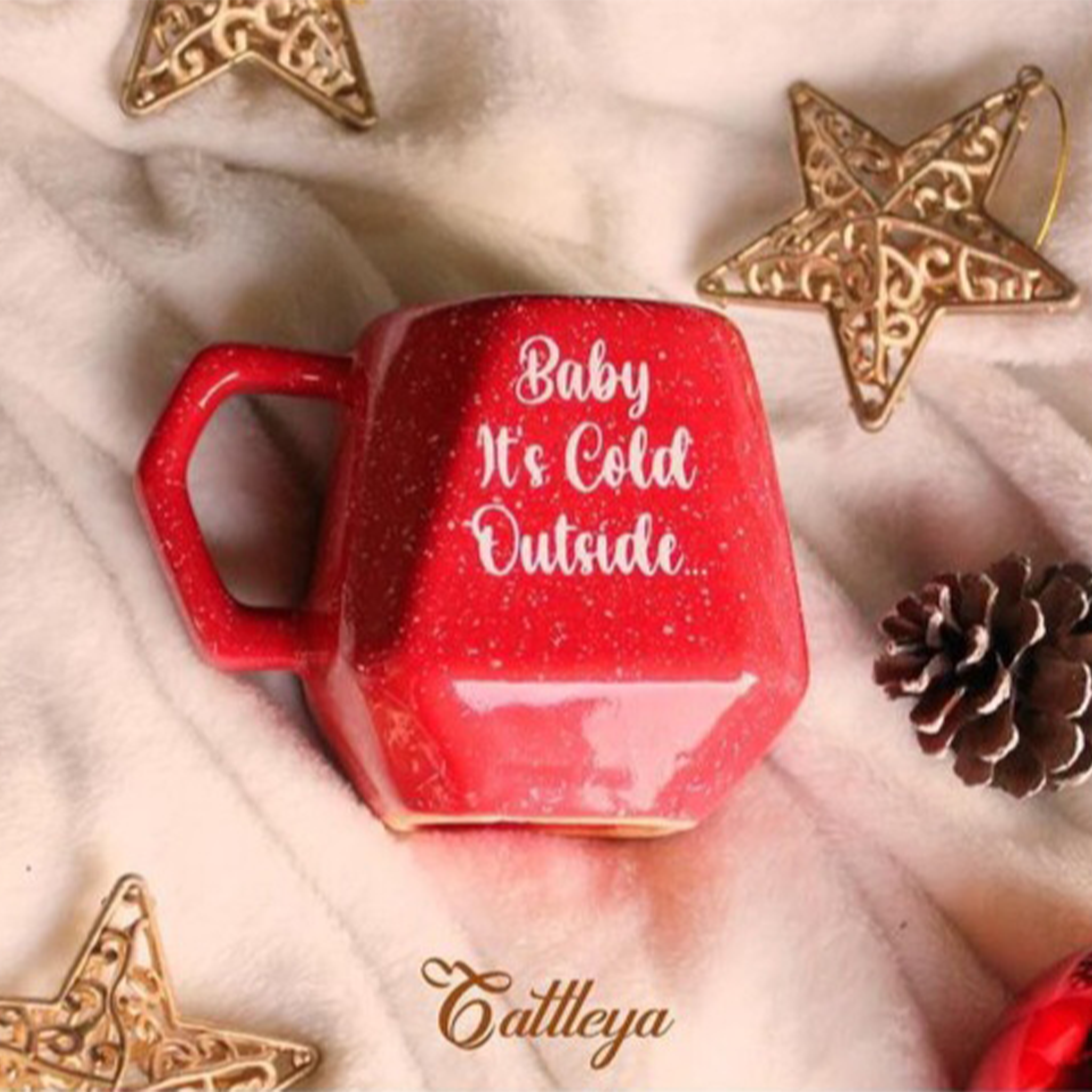 The Cattleya Egypt Handcrafted Christmas Ceramic Mugs Collection, featuring red, green, and frost designs.