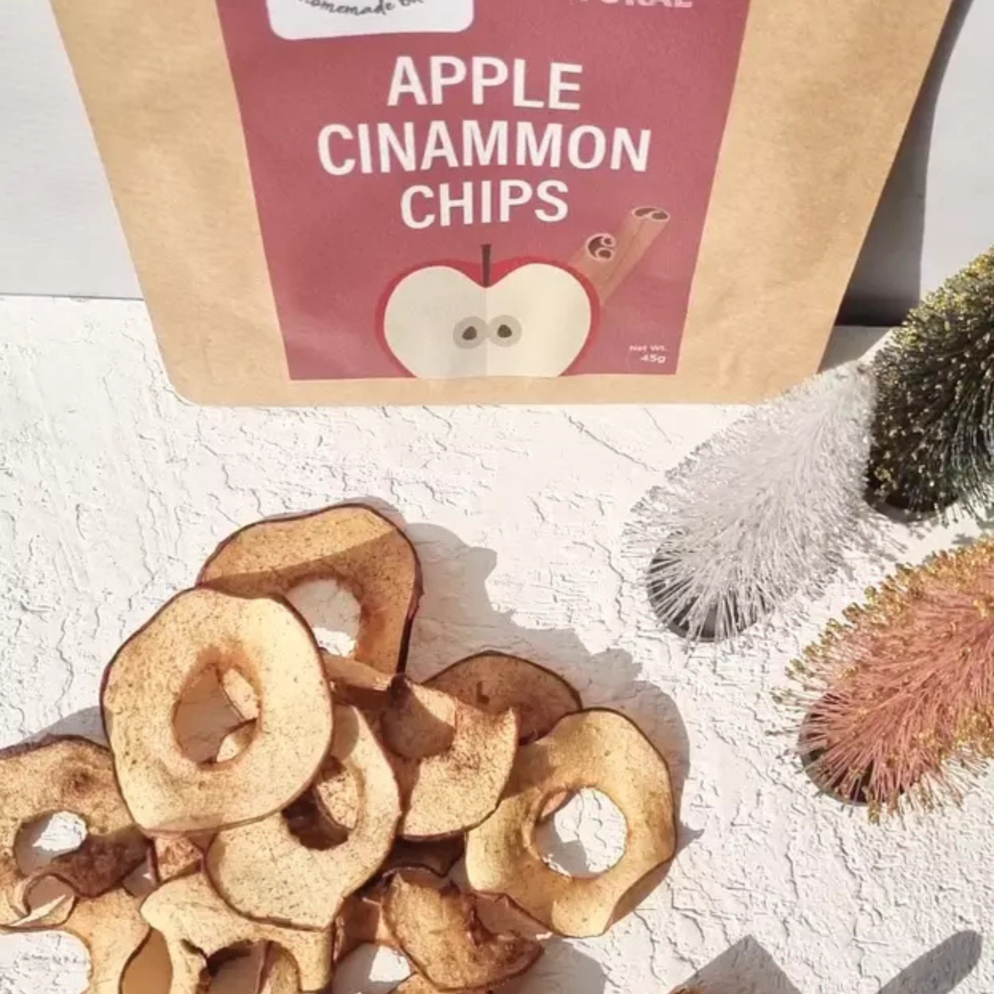 A pack of Dansnack Fruit Chips Mix with mango, pineapple, watermelon, and orange - a natural, dehydrated snack from Egypt.