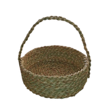 A handwoven Khoos (palm frond) basket from Elmeraki, showcasing traditional Egyptian craftsmanship.