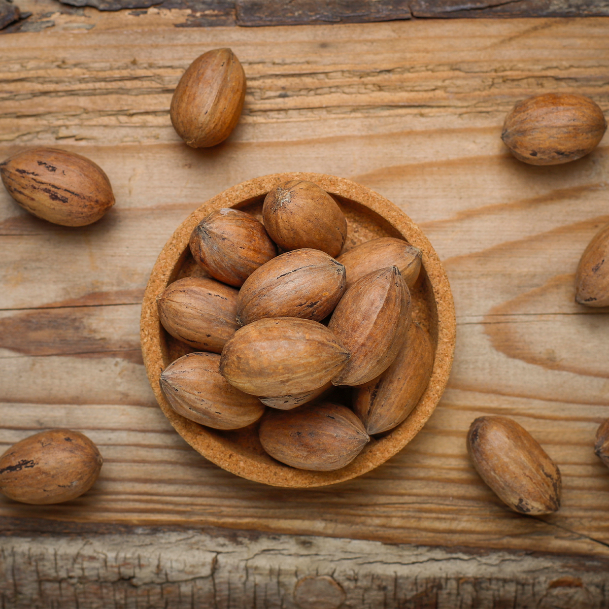 A package of Elmeraki's raw pecan nuts, known for their brain and heart-healthy fats.