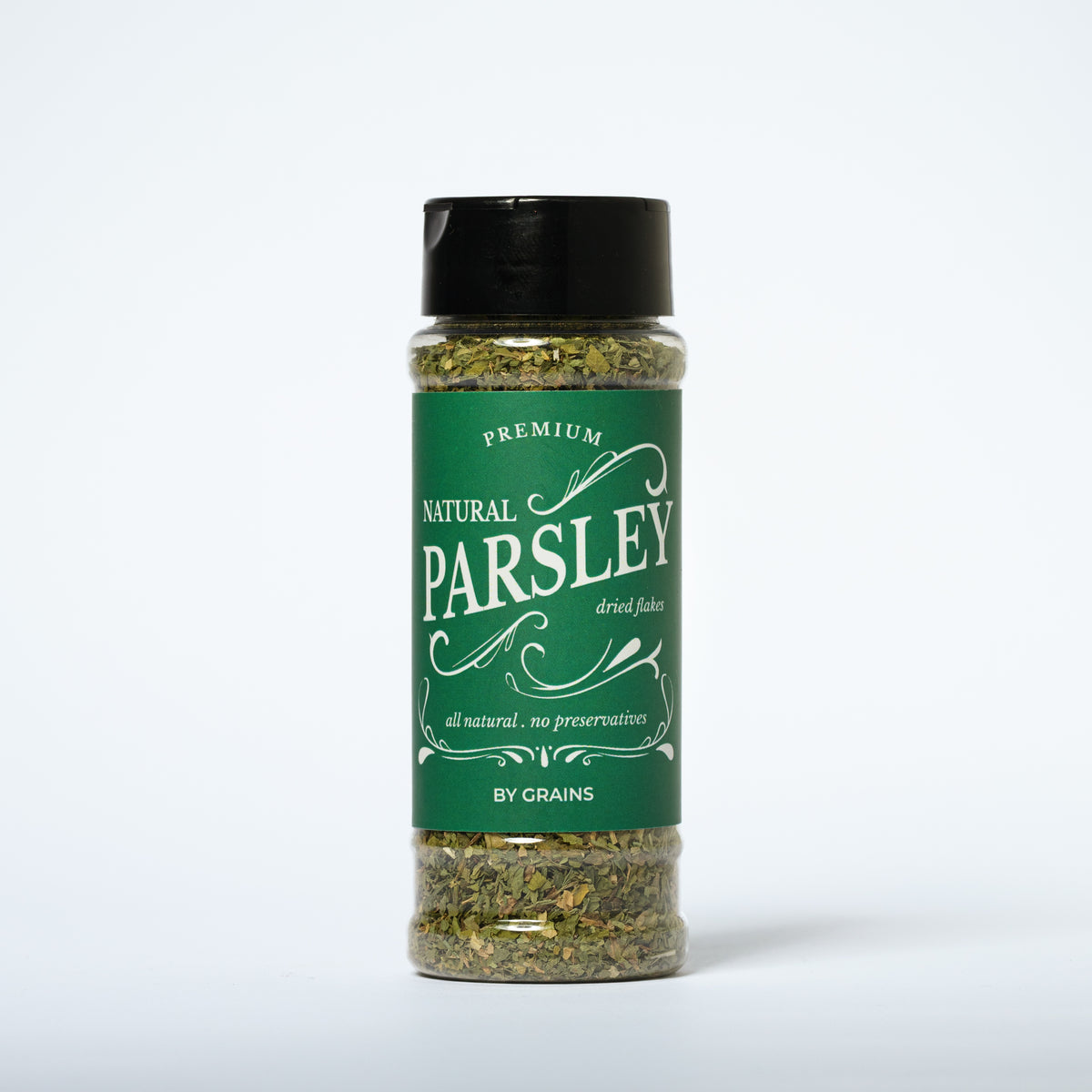 Grains Natural Parsley Flakes 110g - Premium dried parsley flakes with vibrant green color in a clear glass jar | رقائق البقدونس الطبيعي من جرينز ١١٠ جرام - رقائق بقدونس مجفف عالية الجودة بلون أخضر نابض بالحياة في وعاء زجاجي شفاف