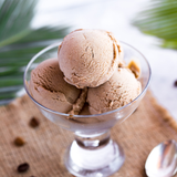 assortment of 10 ice cream flavors in tubs – chocolate, mango, pistachio, matcha, and more.