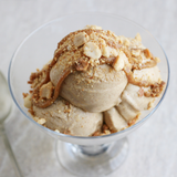 assortment of 10 ice cream flavors in tubs – chocolate, mango, pistachio, matcha, and more.