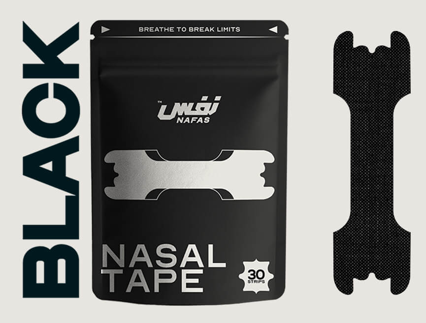 Discreet Black Nafas Nasal Tape applied on a person's nose, available at El Meraki.