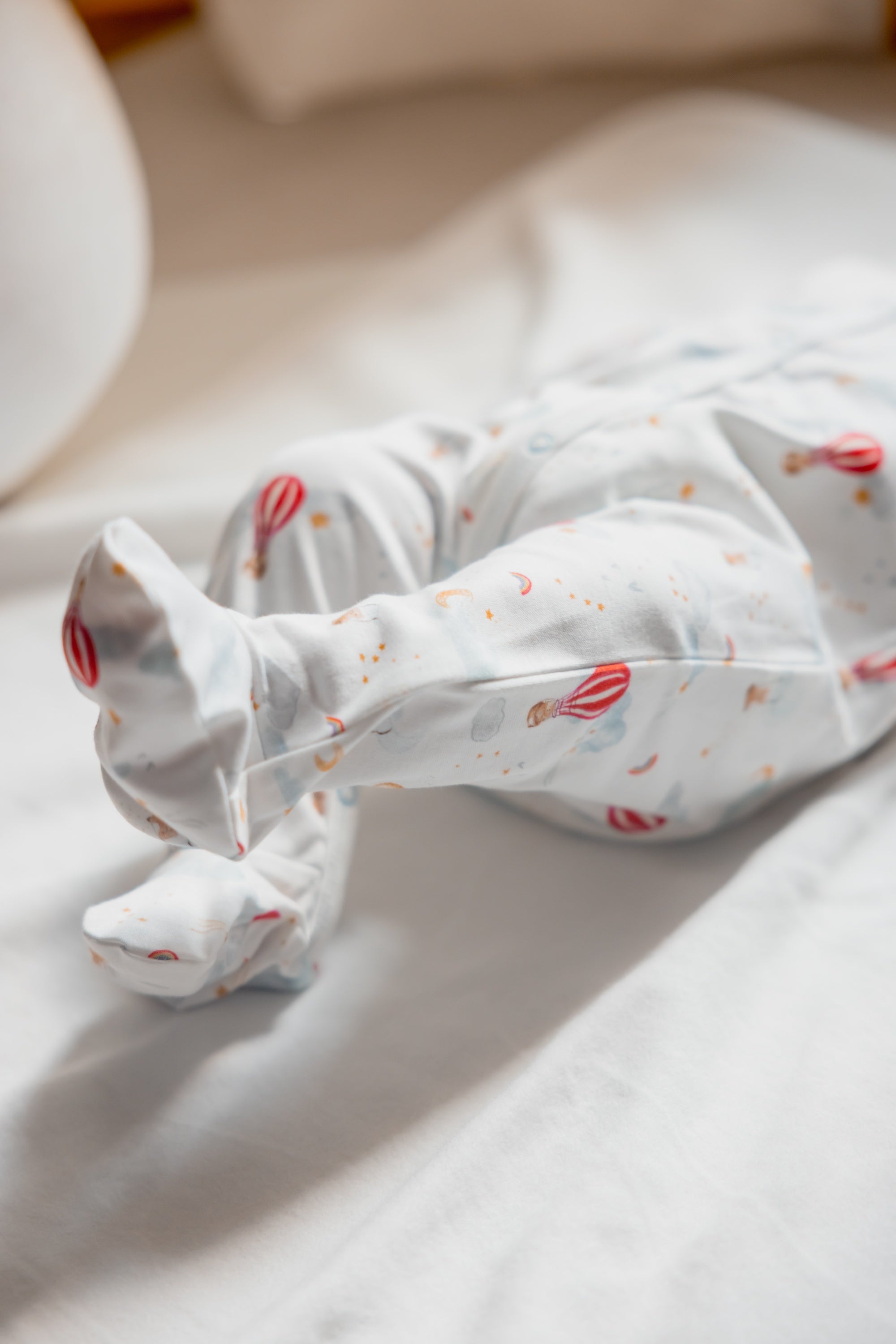 Under the Nile Dreamland Boys Baby Sleepsuit in soft organic cotton with full snap closures