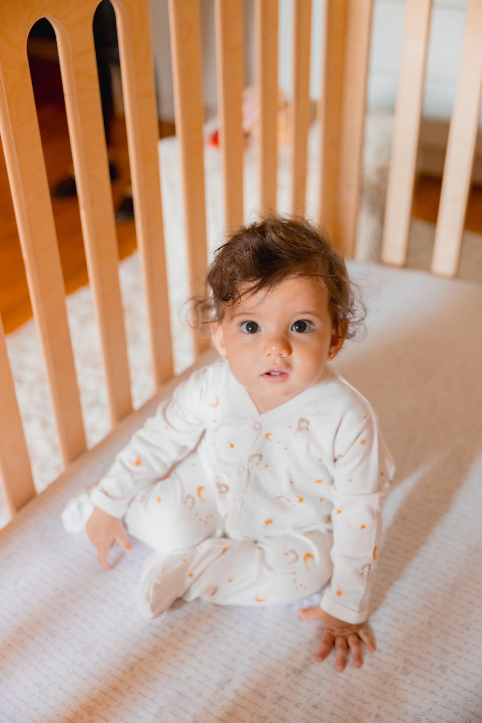 Under the Nile Dreamland Girls Baby Sleepsuit in soft organic cotton with snap closure