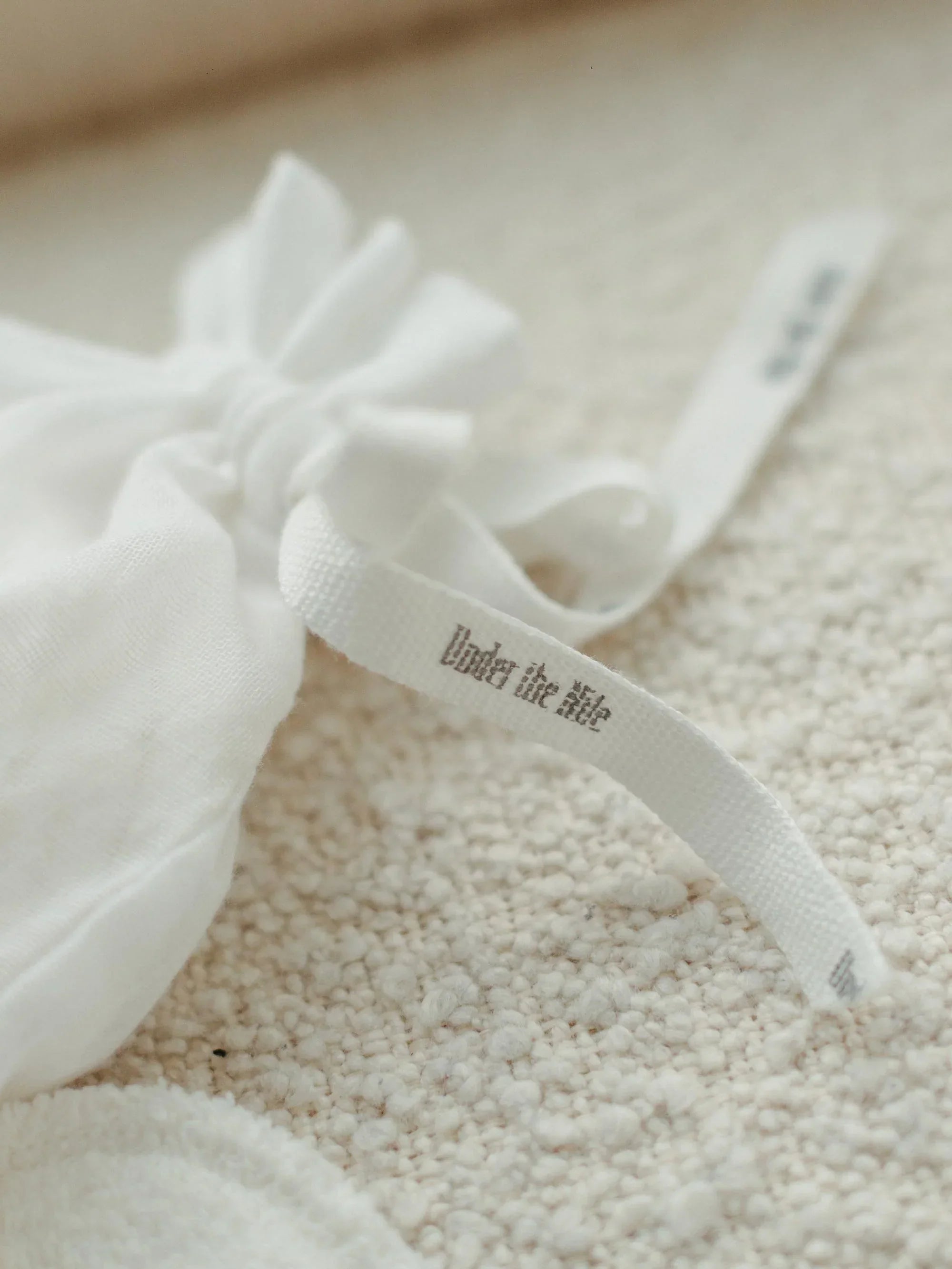 Under the Nile Pearl Blue Newborn Essentials Set featuring organic cotton baby clothes.