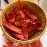 A pack of Dansnack Fruit Chips Mix with mango, pineapple, watermelon, and orange - a natural, dehydrated snack from Egypt.