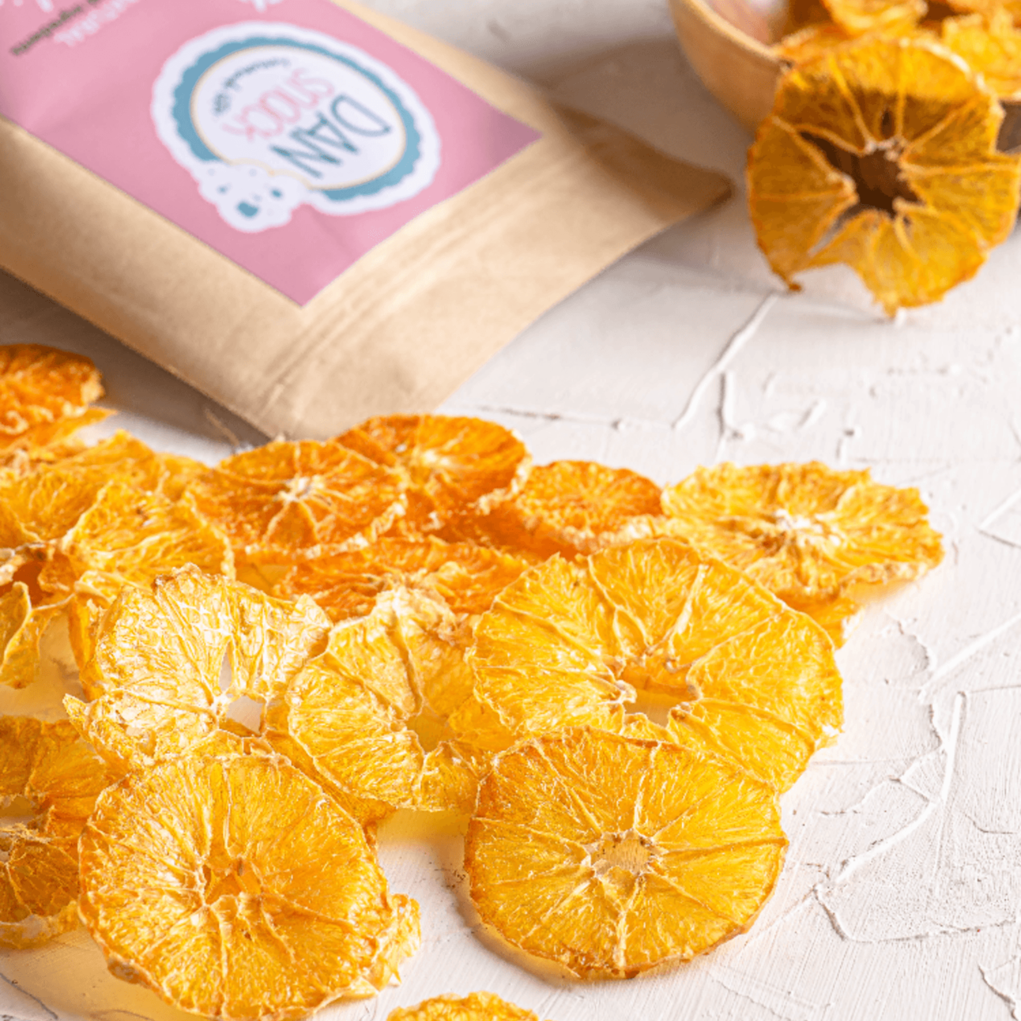 A pack of Dansnack Fruit Chips Mix with mango, pineapple, watermelon, and orange - a natural, dehydrated snack from Egypt.
