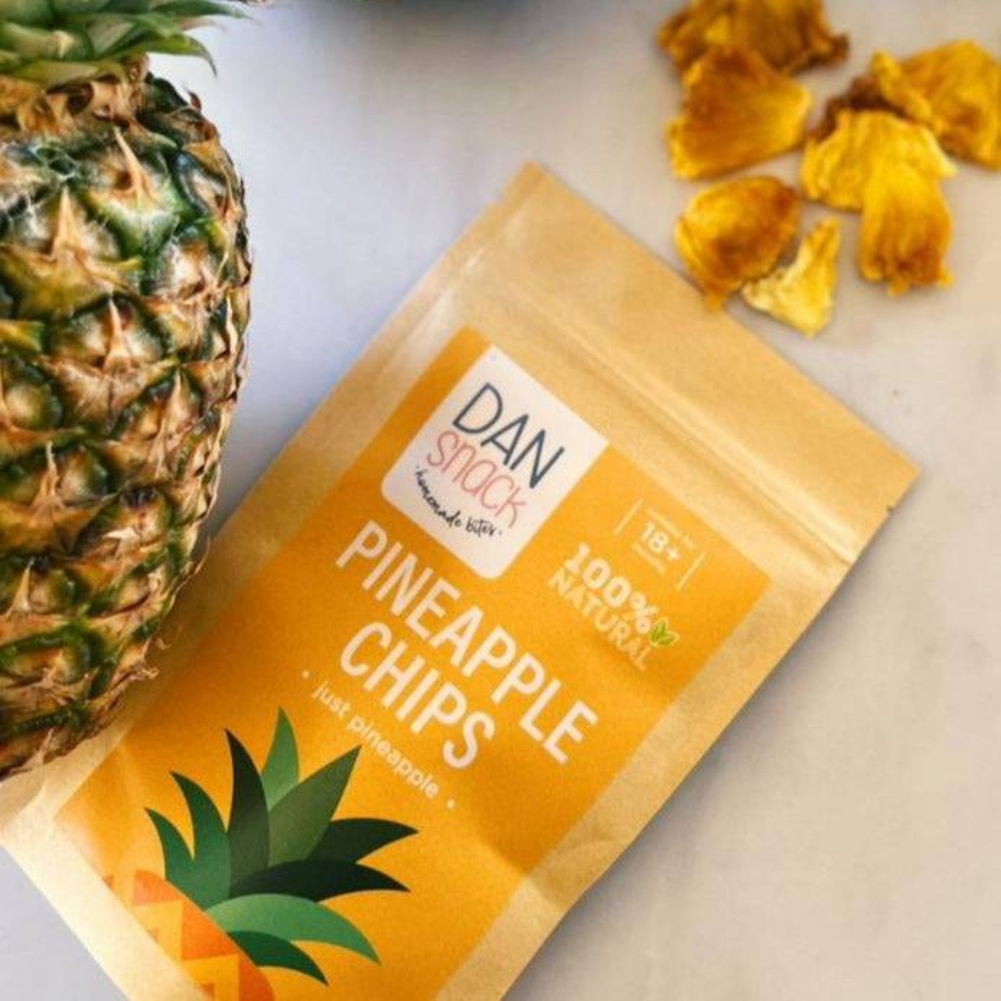 A pack of Dansnack Fruit Chips Mix with mango, pineapple, watermelon, and orange - a natural, dehydrated snack from Egypt.