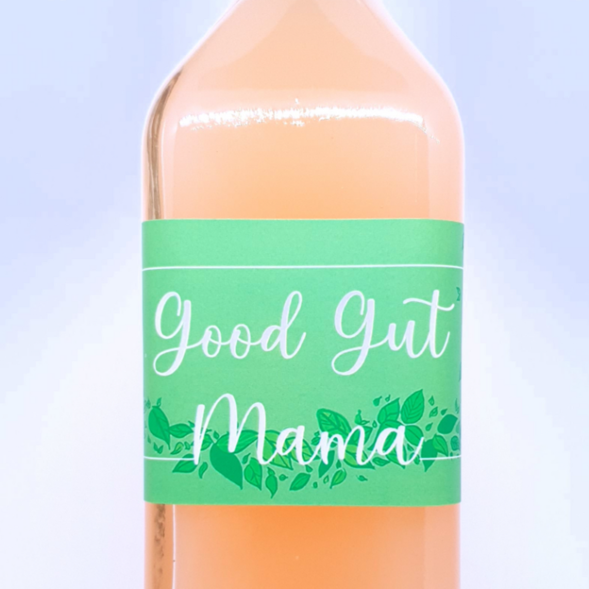 Bottle of Good Gut Mama Raw Unfiltered Apple Cider Vinegar with the "mother" from Egypt, showing its natural, cloudy sediment.